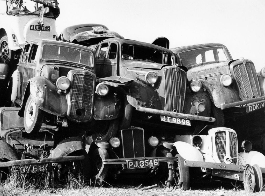 Detail of Old cars piled up in a scrapyard, Britain by Unknown