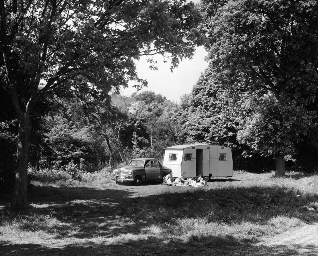 Detail of A family relaxing on holiday with their 1951 Vauxhall Wyvern and caravan, (1951?) by Unknown