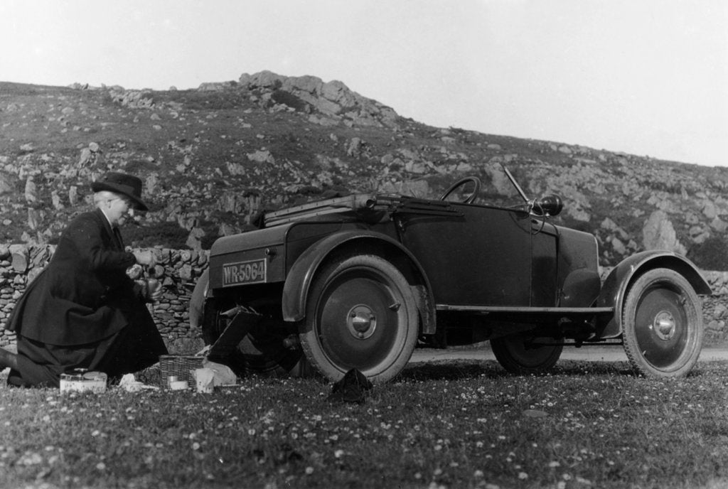 Detail of A woman picnicking next to her air-cooled Rover 8, c1919-c1925 by Unknown