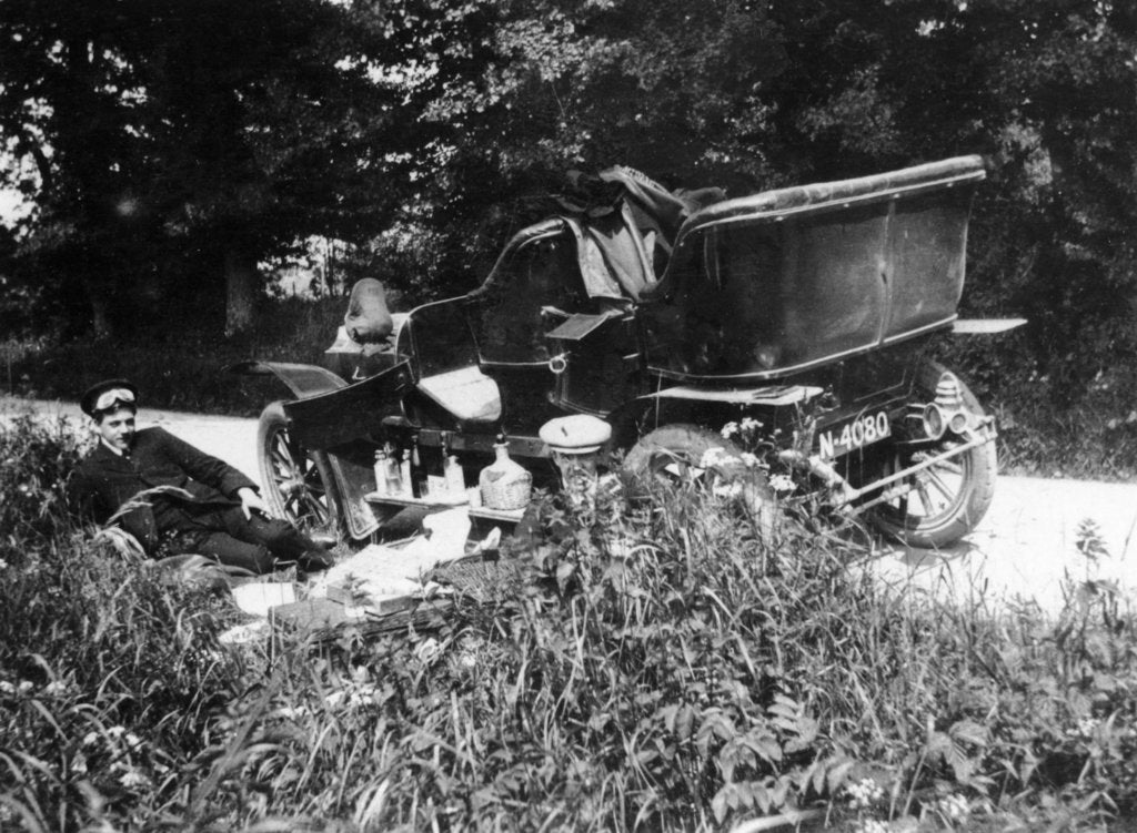 Detail of Two men picnicking beside a Vauxhall car, c1906 by Unknown