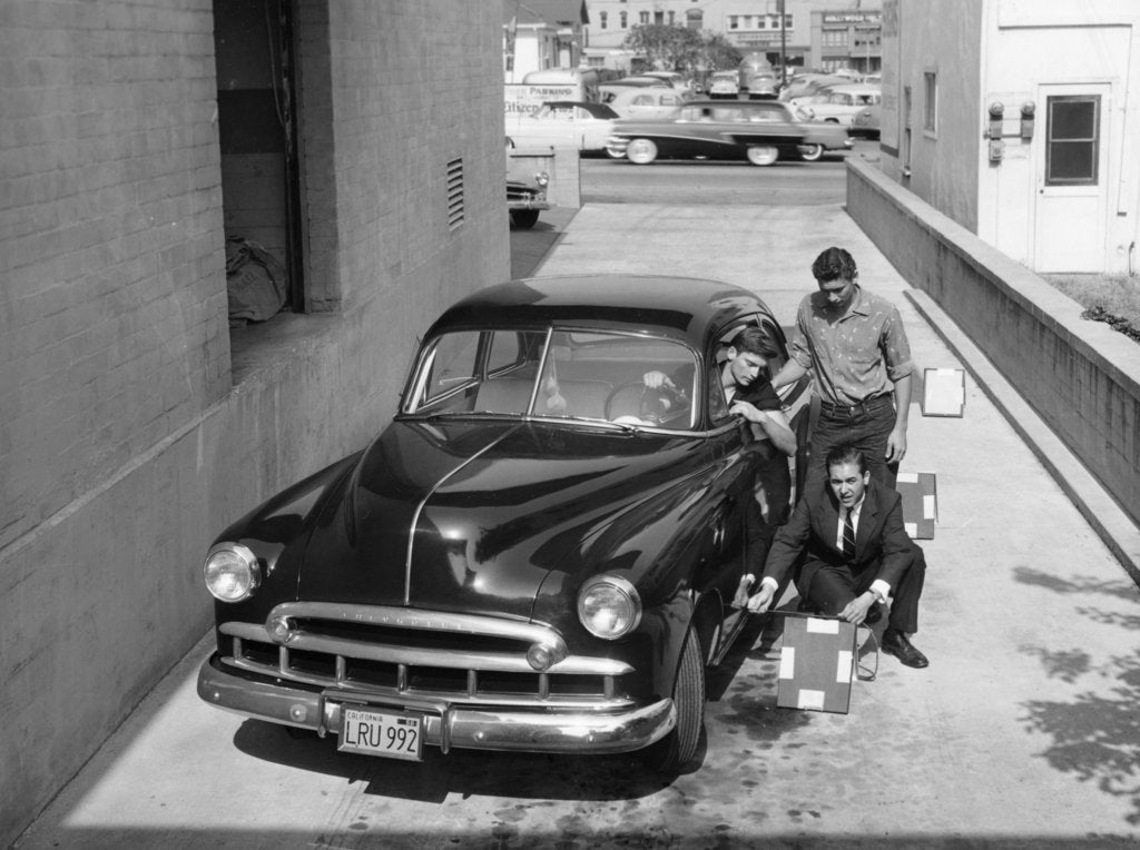Detail of Men with a 1949 customised Chevrolet, (c1949?) by Unknown
