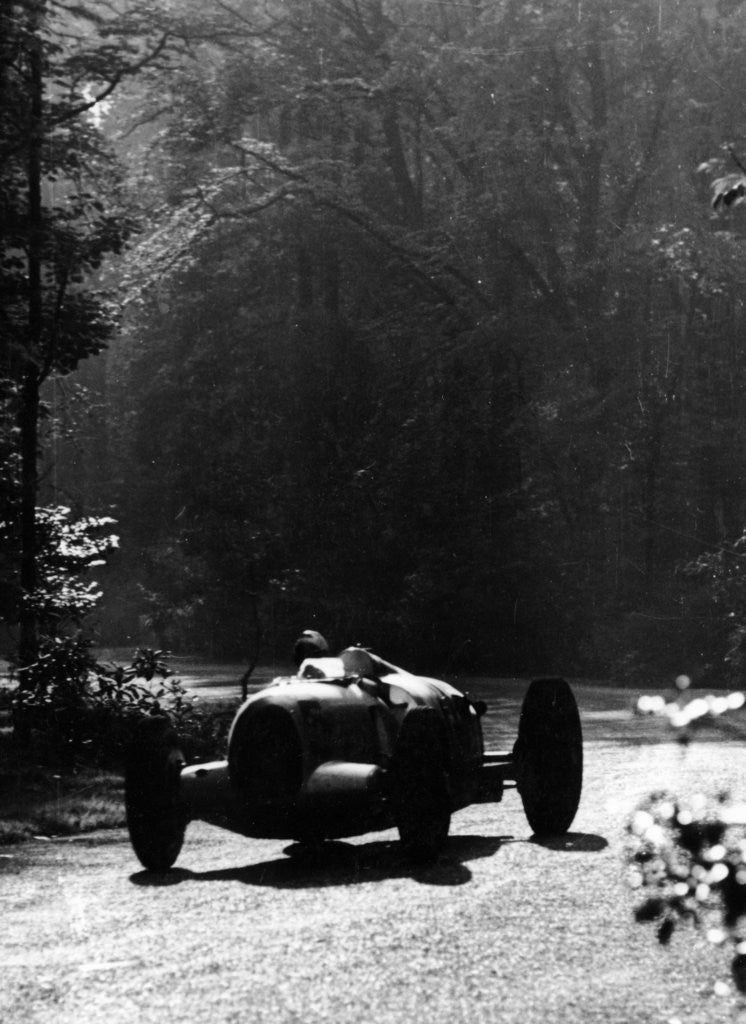 Detail of Bernd Rosemeyer driving an Auto Union, Donington Grand Prix by Anonymous