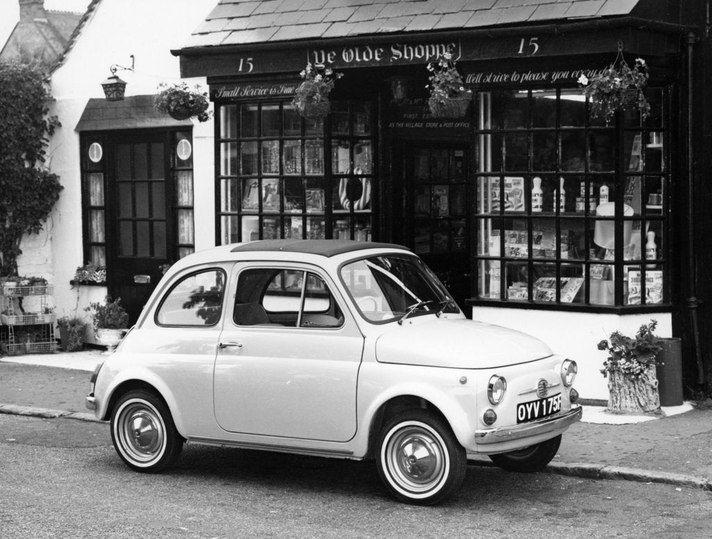 Detail of Fiat 500 parked outside a quaint shop, 1969 by Unknown