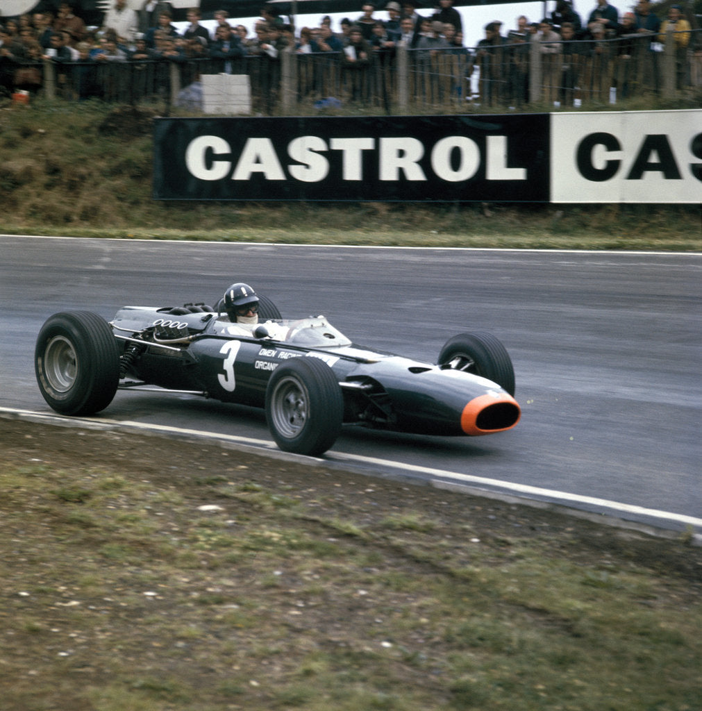 Detail of Graham Hill racing a BRM P261, British Grand Prix, Brands Hatch, Kent, 1966 by Unknown