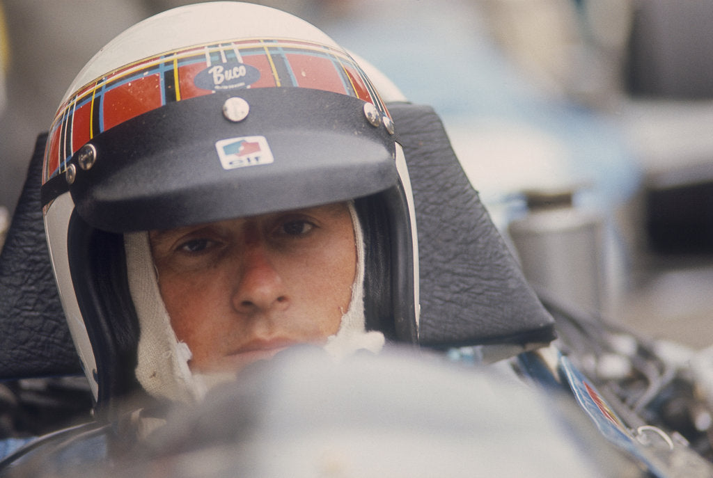 Detail of Jackie Stewart at the wheel of a racing car by Unknown