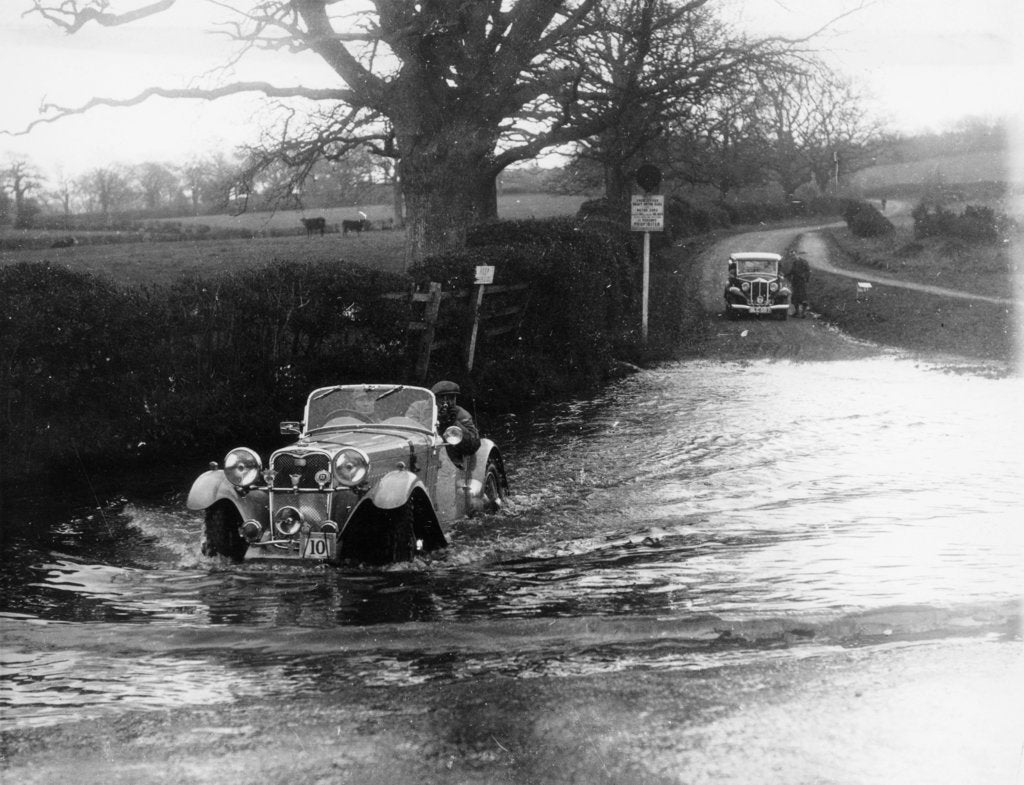 Detail of 1935 Singer 1.5 Litre Le Mans taking part in a water splash trial, (1935?) by Unknown
