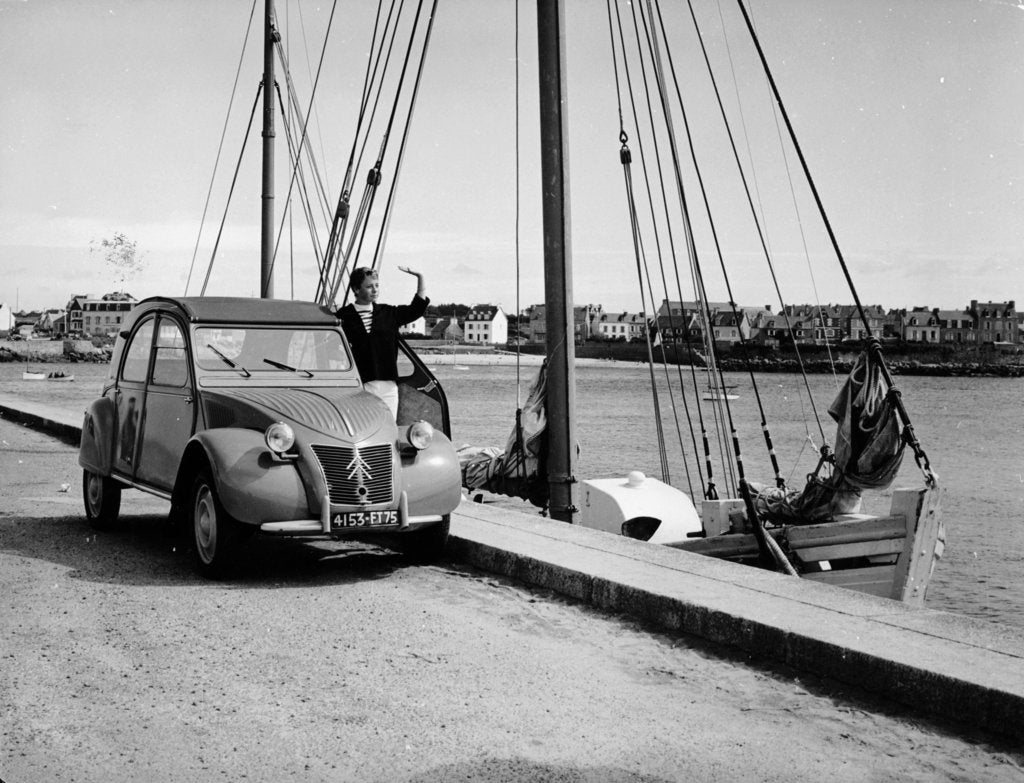 Detail of A Citroën 2CV on the quay at a harbour, c1957 by Unknown
