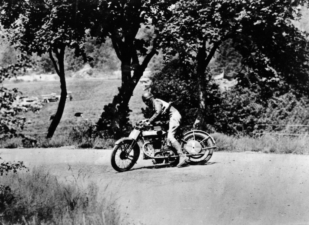Detail of A man on a Norton bike taking part in the Belgian Grand Prix by Anonymous