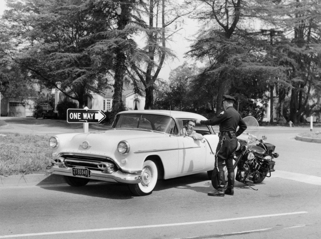 Detail of An Oldsmobile at the corner of an American street, 1954 by Unknown