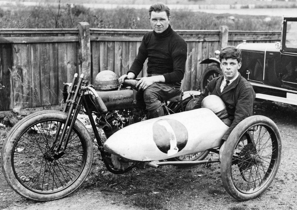 Detail of FW Dixon on a Harley-Davidson, with a passenger in the sidecar, 1921 by Unknown
