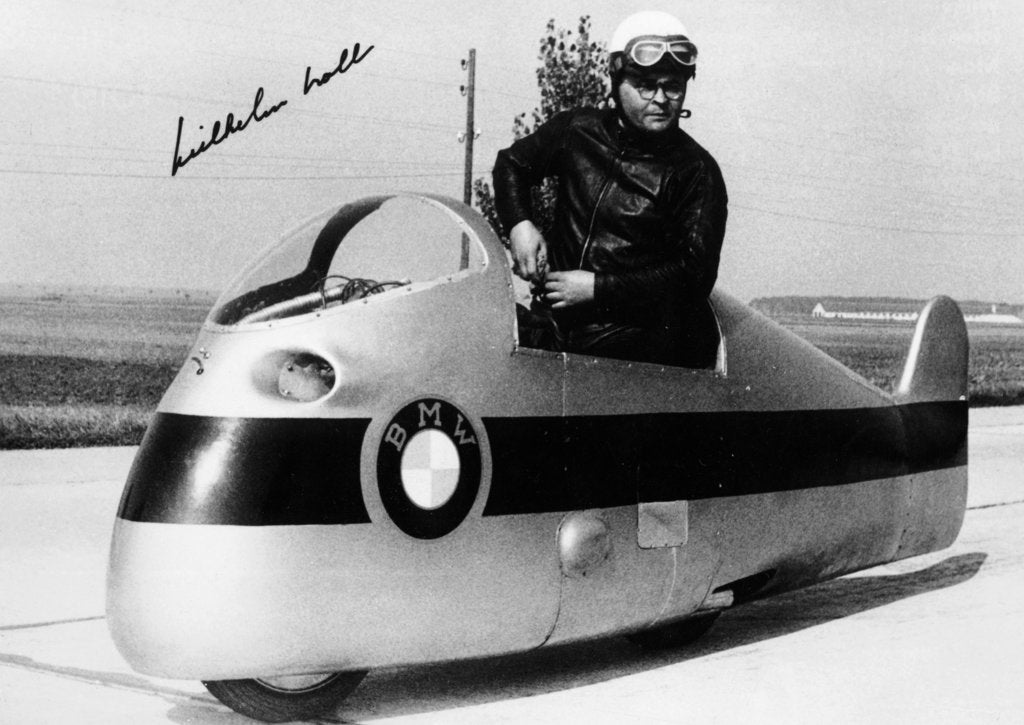 Detail of Wilhelm Noll on a 500cc BMW motorcycle, 1955 by Unknown