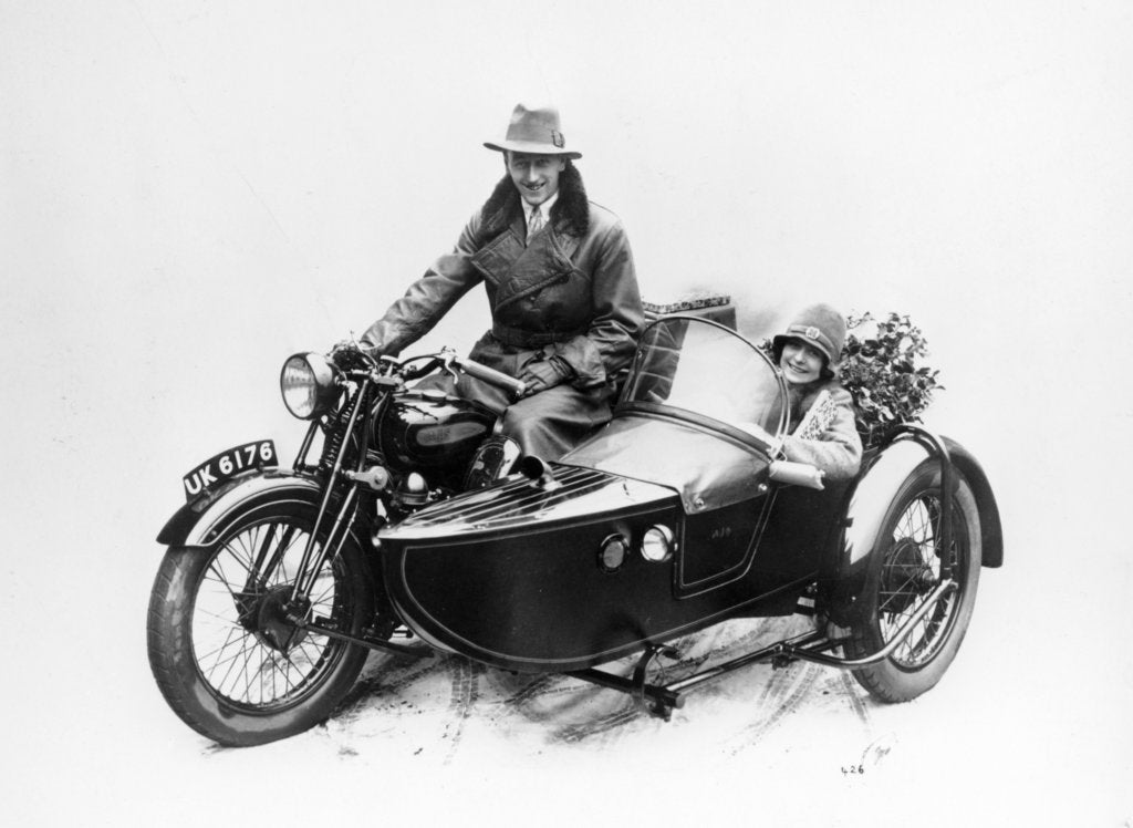 Detail of Man riding an AJS motorbike with a woman in the sidecar, 1939 by Unknown