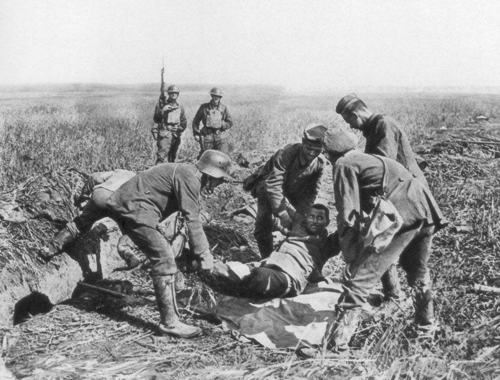 Detail of Wounded German soldier being moved by prisoners, Aisne, France by Anonymous