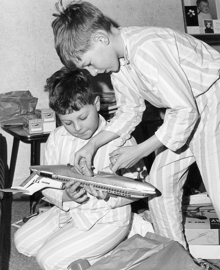 Detail of Boys playing with a model plane, c1960s by Tony Boxall