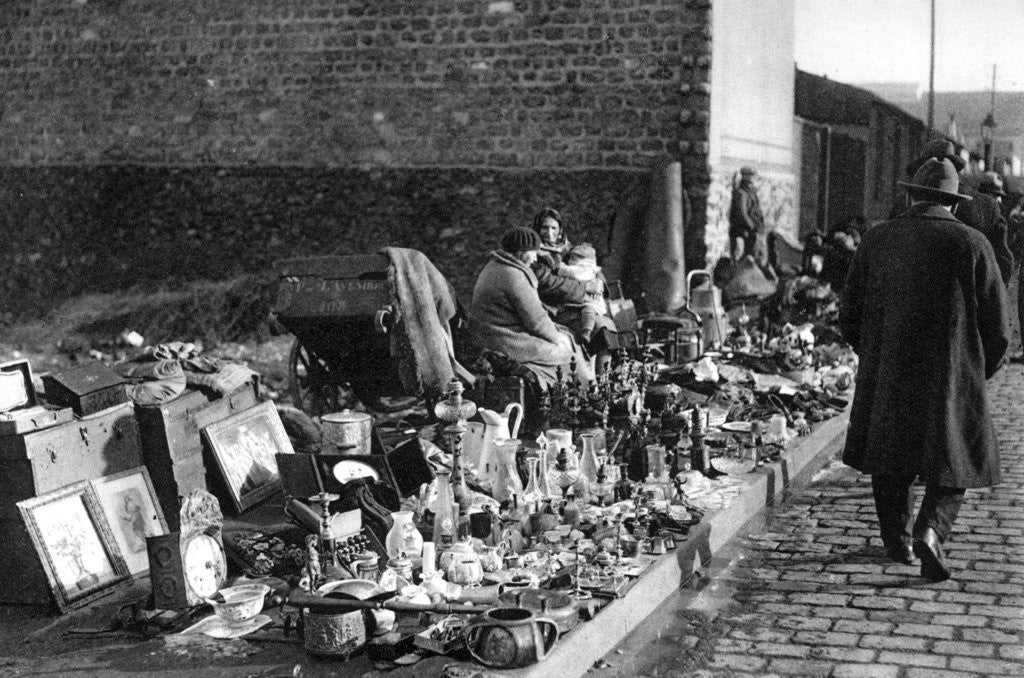 Detail of A display of goods at the flea market, Paris by Ernest Flammarion