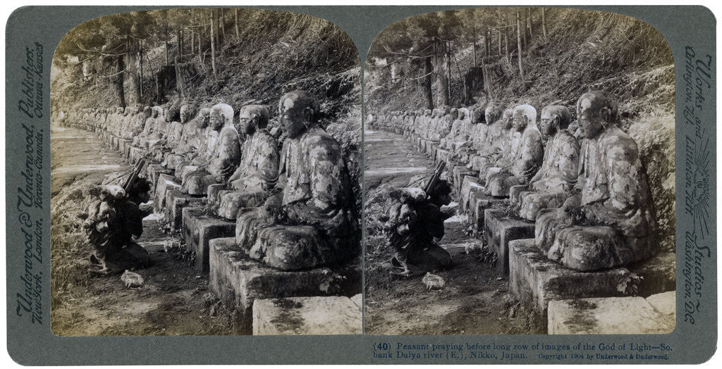 Detail of Peasant praying before a row of statues of the God of Light, Daiya river, Nikko, Japan by Underwood & Underwood