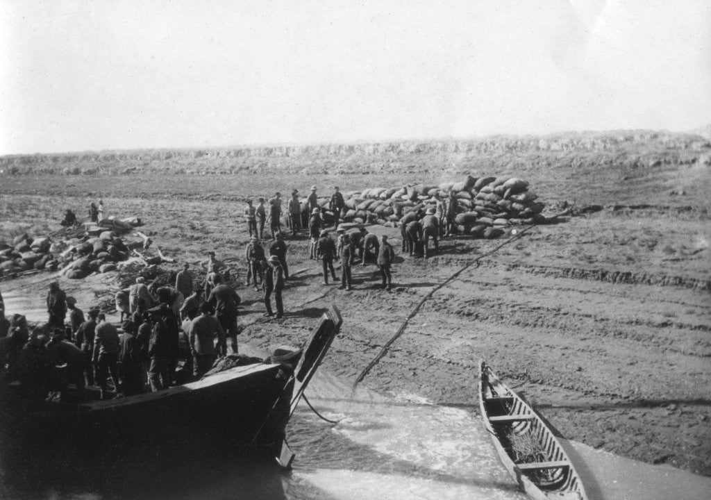 Detail of British troops unloading dates on the shore of the Tigris river by Anonymous