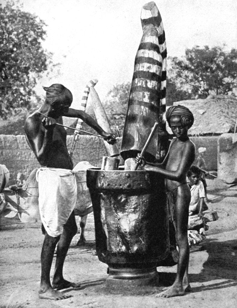 Detail of Sesame mill painted in honour of a Hindu goddess, India by Ewing Galloway