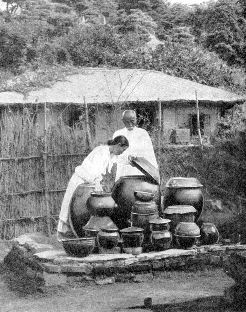 Detail of White-robed inhabitants of Korea by Wide World Photos