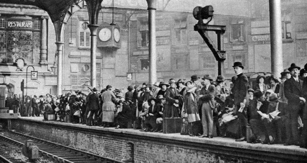 Detail of A bank holiday crowd waiting for a train to Margate, London by Anonymous