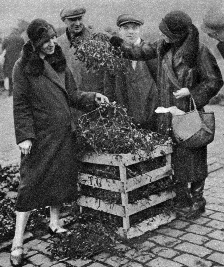 Detail of Women choosing bunches of mistletoe, Caledonian Market, London by Anonymous
