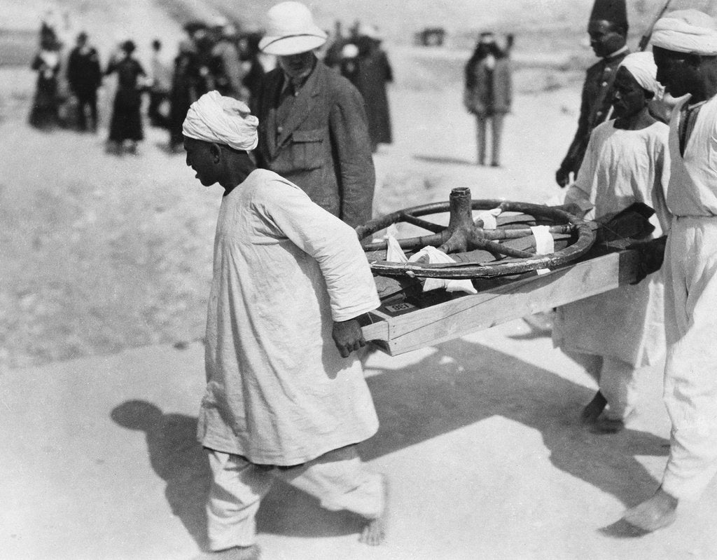 Detail of Removing a chariot wheel from the Tomb of Tutankhamun by Harry Burton