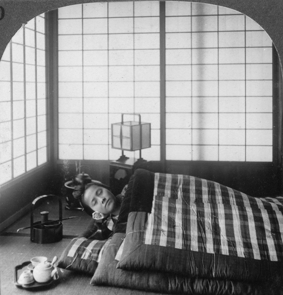 Detail of A geisha sleeping in a tea house, Hikone, Japan by Underwood & Underwood