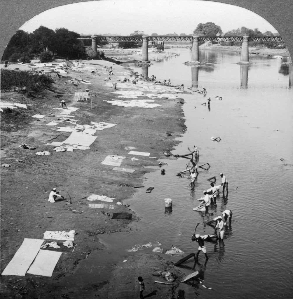 Detail of Dbobies washing clothes in the Goomti River, near Lucknow, India by Underwood & Underwood