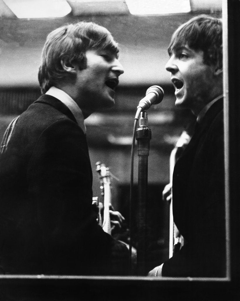 Detail of John Lennon and Paul McCartney in a recording studio by Associated Newspapers