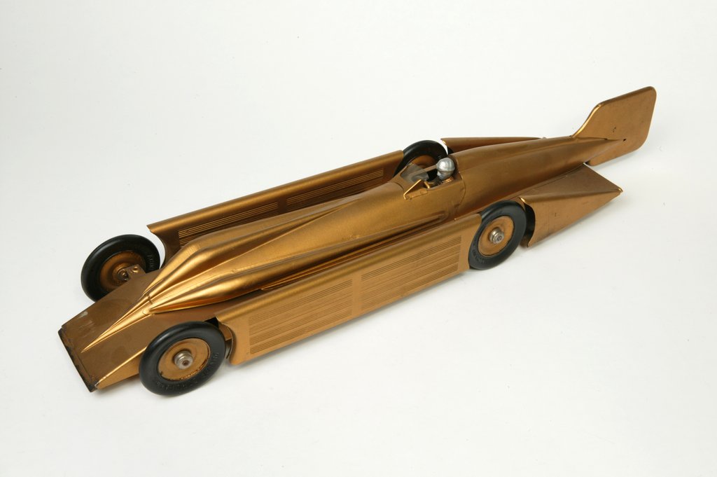 Detail of Clockwork toy racing car, Golden Arrow Racer by Kingsbury Manufacturing Co