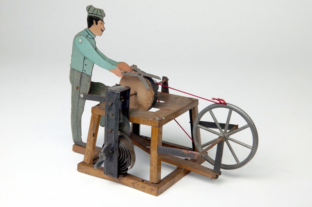 Detail of Toy scissor grinder by Unknown