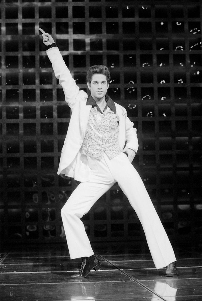 Detail of Adam Garcia in a scene from Saturday Night Fever by Graham Brandon