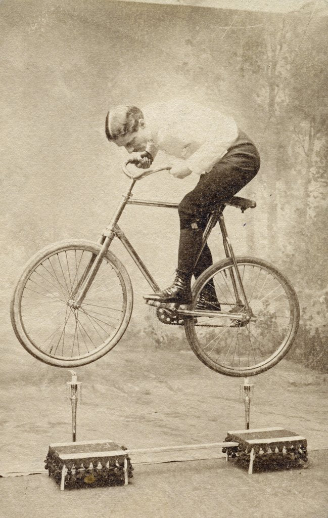 Detail of Trick Cyclist Balancing on Candles by Anonymous