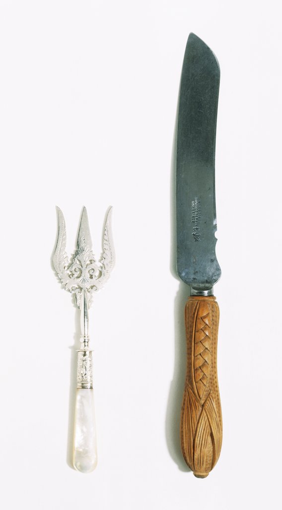 Detail of Bread knife and fork by Wingfield Rowbothan & Co.