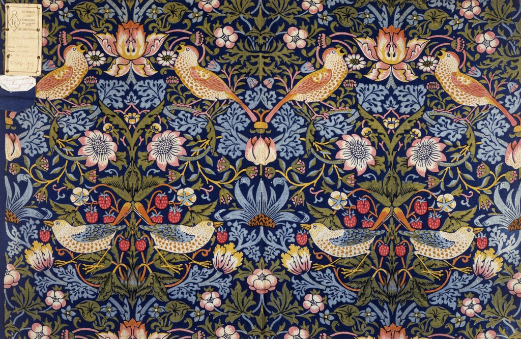 Detail of Strawberry Thief furnishing fabric by William Morris