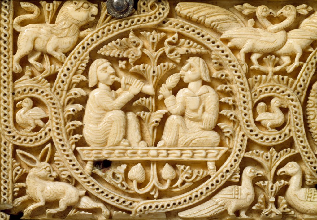 Detail of Casket carved with views of musicians & drinkers, detail by Anonymous