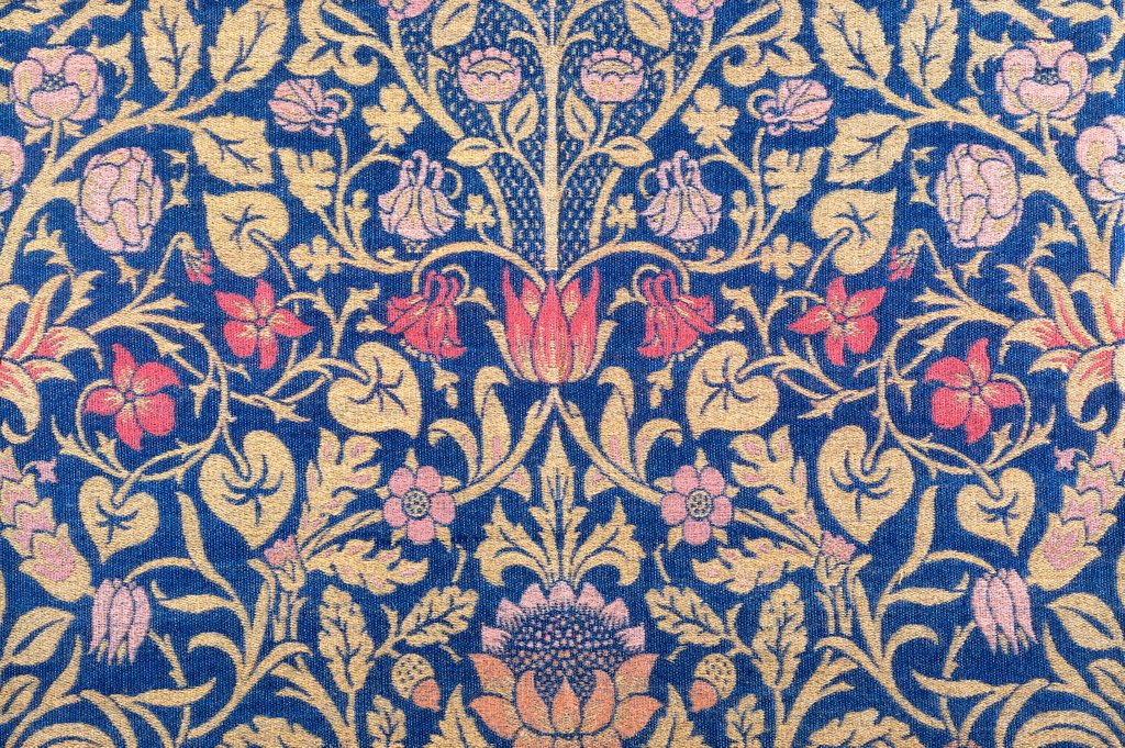 Detail of Violet and Columbine furnishing fabric by William Morris