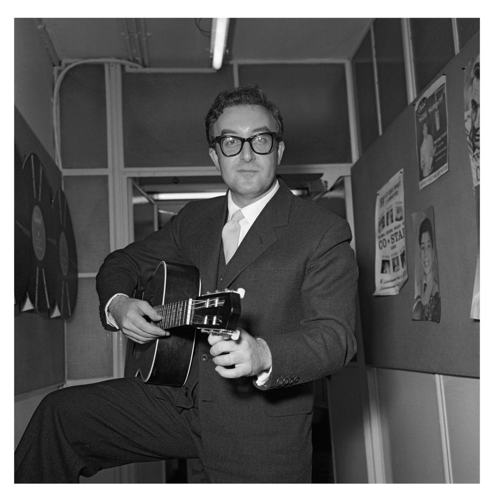 Detail of Peter Sellers holding a guitar by Harry Hammond
