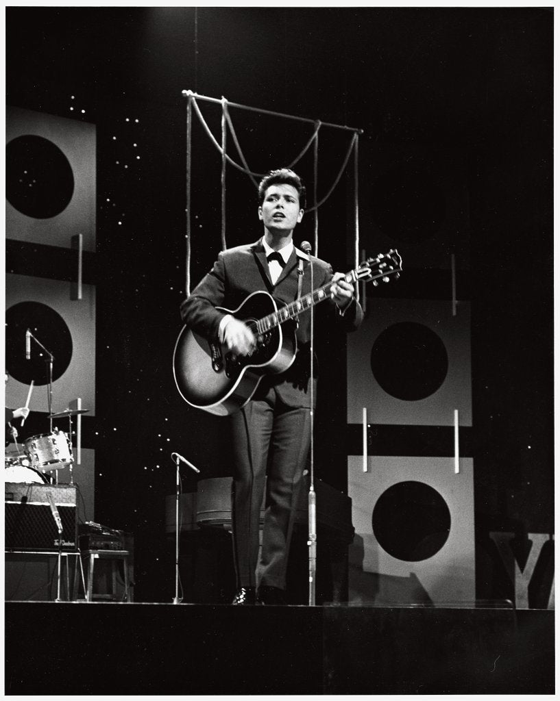Detail of Cliff Richard on stage by Harry Hammond