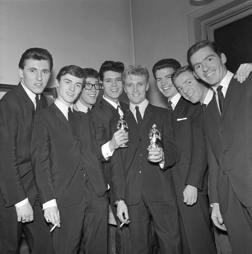 Detail of Cliff Richard holding awards by Harry Hammond