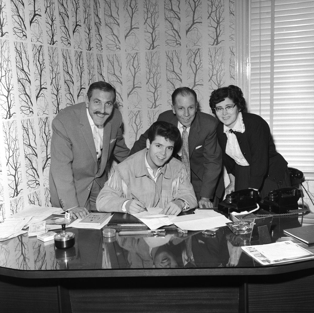 Detail of Cliff Richard and his parents at his first signing by Harry Hammond