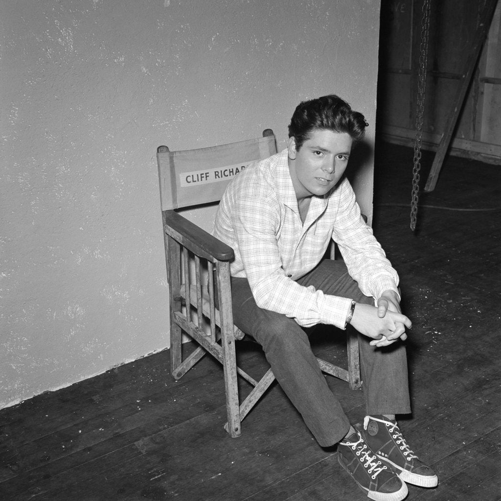 Detail of Cliff Richard taking a break during Express Bongo by Harry Hammond