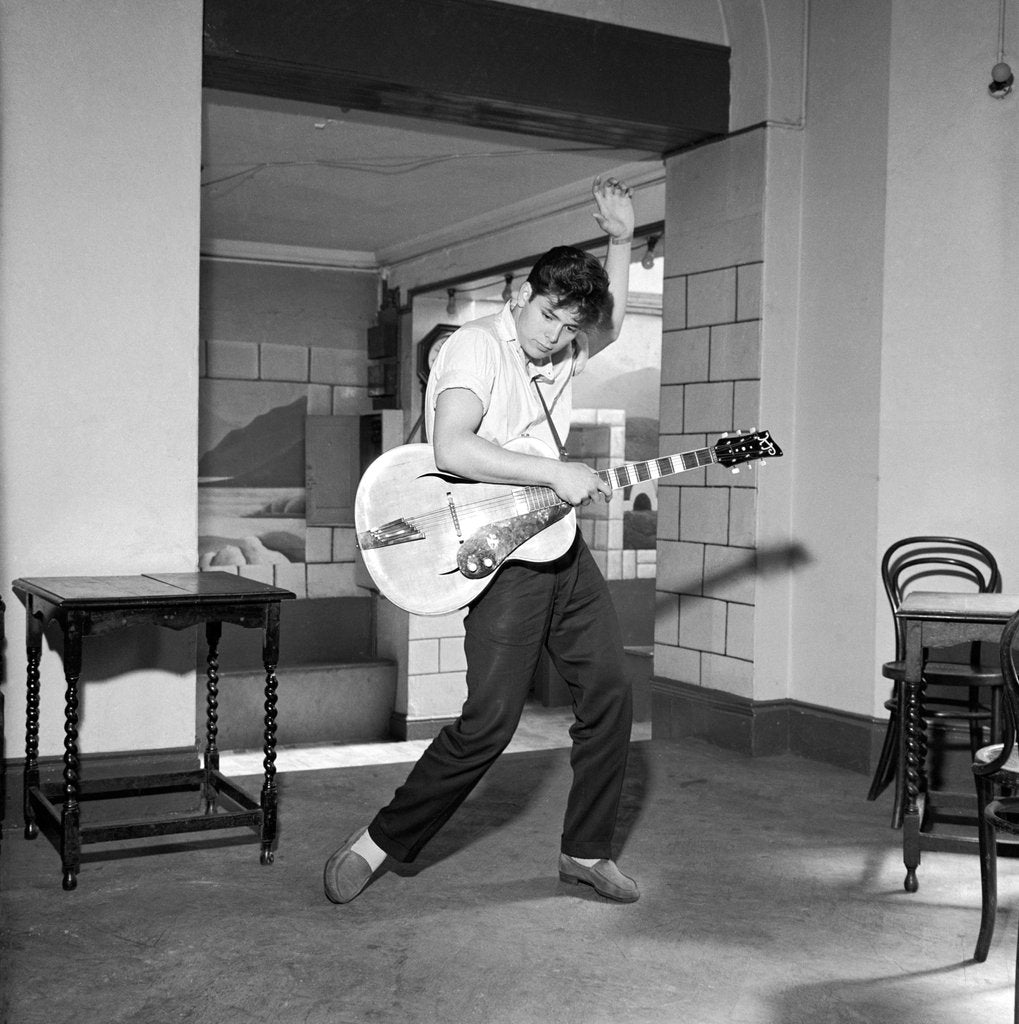Detail of Cliff Richard playing the guitar by Harry Hammond