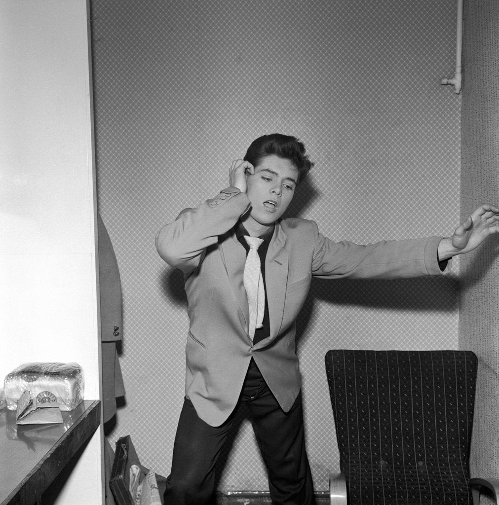 Detail of Cliff Richard rehearsing in a dressing room by Harry Hammond