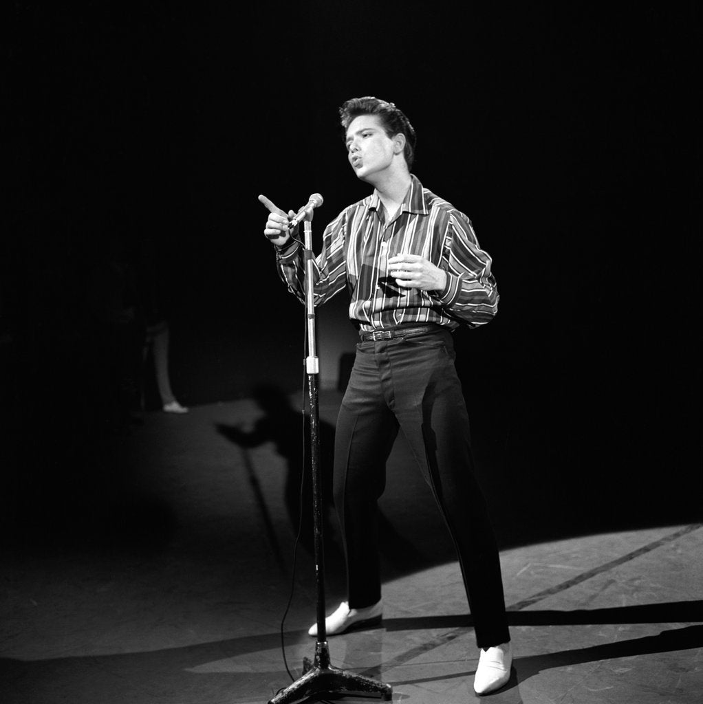 Cliff Richard commanding the stage with the Drifters during his breakthrough television period.