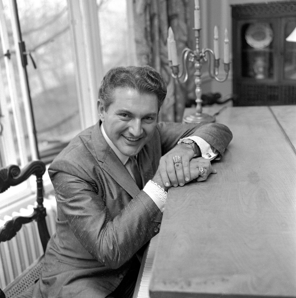 Detail of Liberace seated at the piano at the Savoy Hotel by Harry Hammond