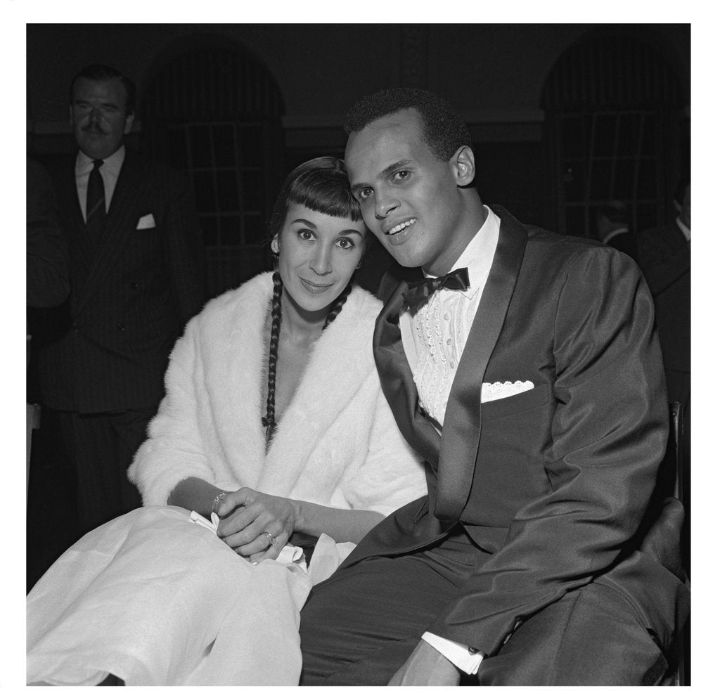 Detail of Harry Belafonte with his wife at Gaumont State by Harry Hammond