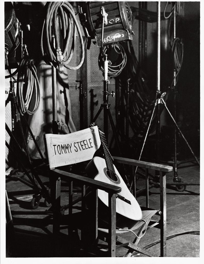Detail of Tommy Steele's chair and guitar by Harry Hammond