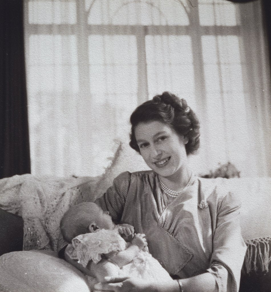 Princess Elizabeth holding her baby son Prince Charles by Cecil Beaton