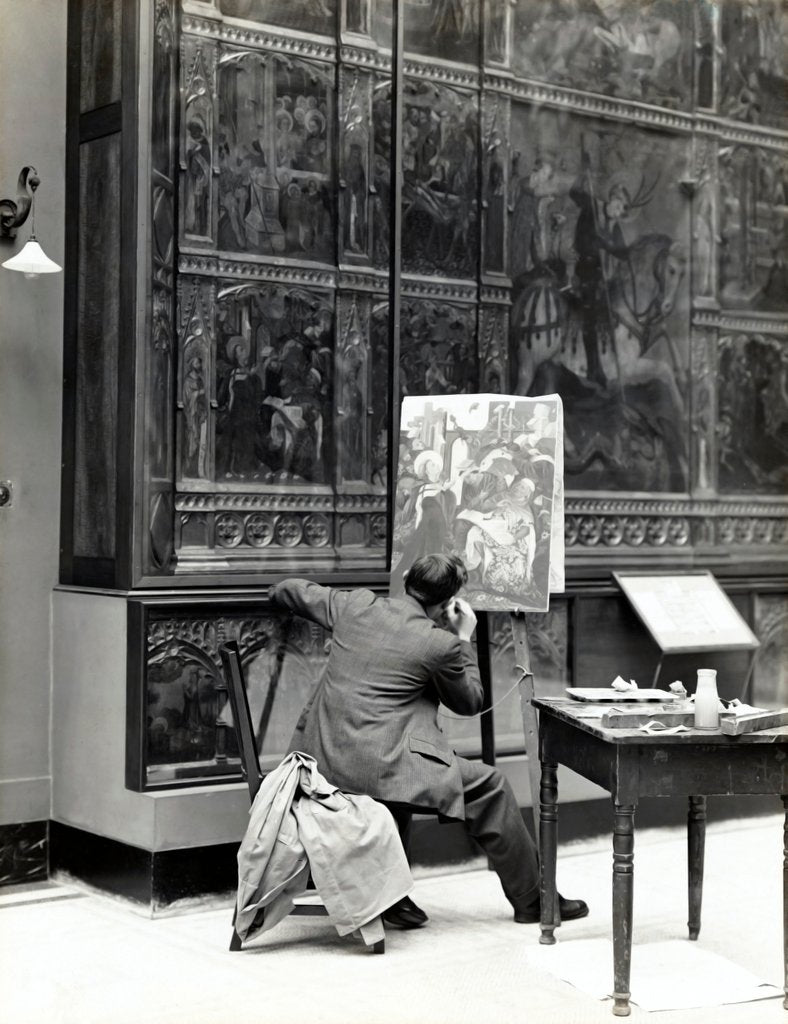 A student painting a copy of the Spanish Retable by Anonymous